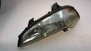 Phare avant gauche occasion - Opel TIGRA - 12 16 523