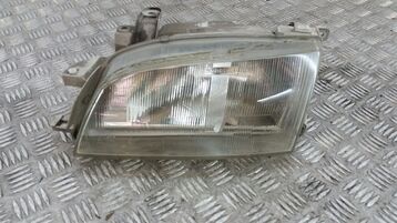 Left headlight used - Toyota CARINA E - 8117005050