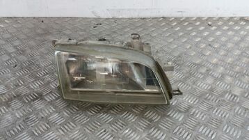 Right headlight used - Toyota CARINA E - 8113005050