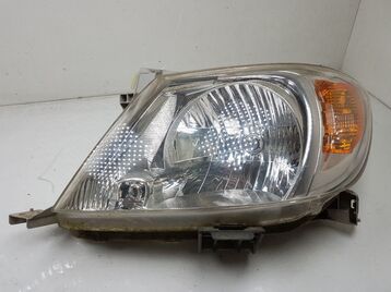 Left headlight used - Toyota HILUX PICKUP - 811700K080